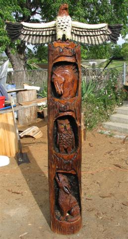 Eagle, Bear, Otter, Fish Totem Pole Carving