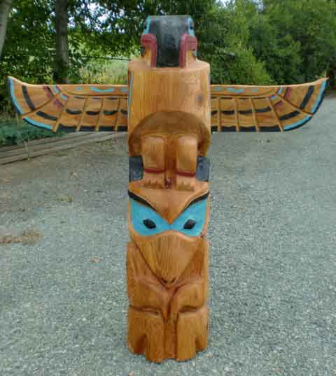 Thunderbird and Wolf Totem Pole Carving